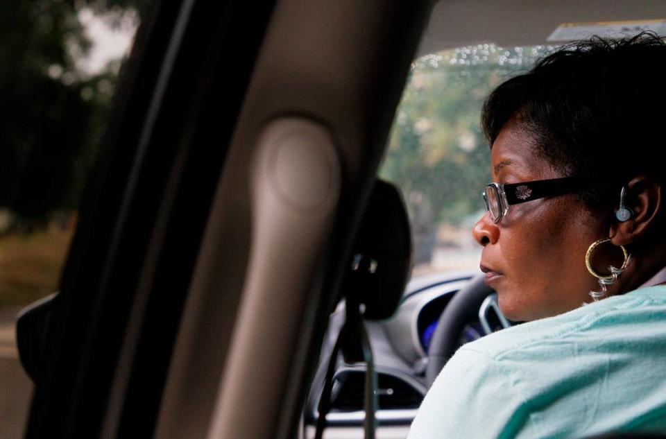 Gwen Baggett, a crisis response clinician with Durham’s HEART team, arrives to follow up on a call in Durham, N.C. on Thursday, June 27, 2024. HEART, which stands for Holistic Empathetic Assistance Response Teams, sends unarmed specialists instead of (or alongside) police to some emergency calls.