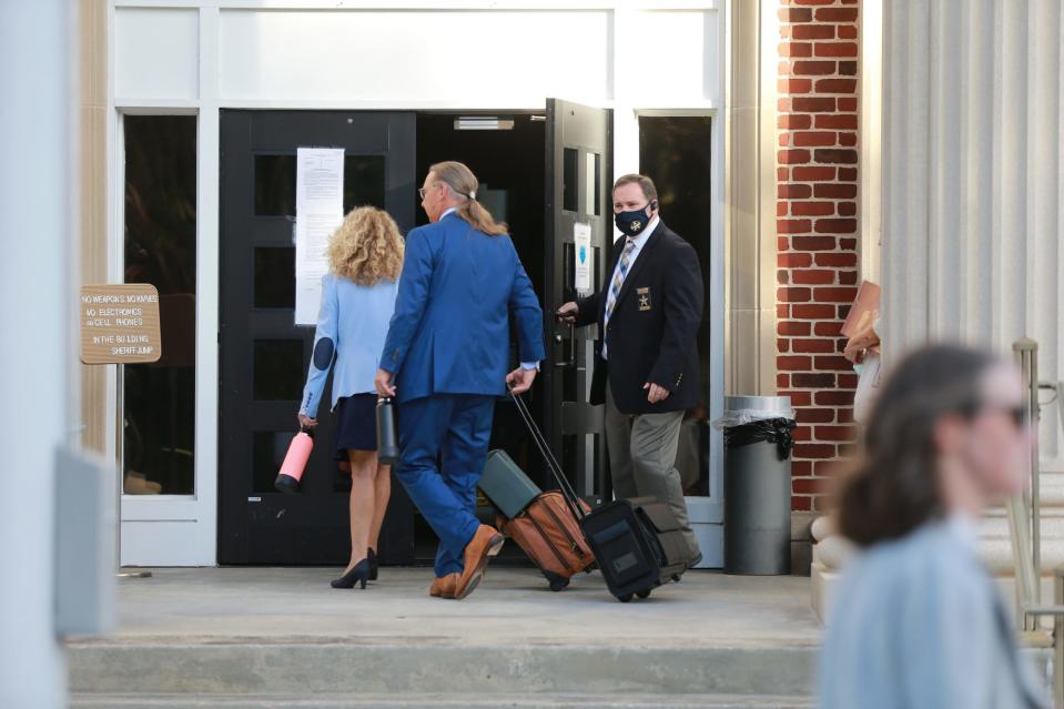 The attorneys for Gregory McMichael enter the Glynn County Courthouse on Monday October 18, 2021.