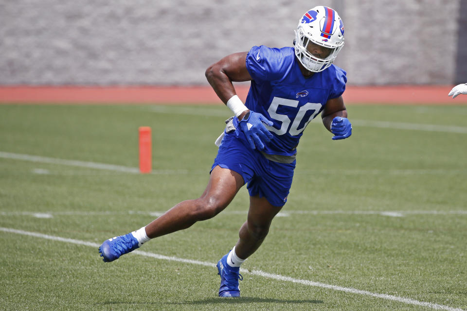 Buffalo Bills defensive lineman Greg Rousseau (50) takes part in drills during the NFL football team's mandatory minicamp in Orchard Park, N.Y., Wednesday, June 15, 2022. (AP Photo/Jeffrey T. Barnes)