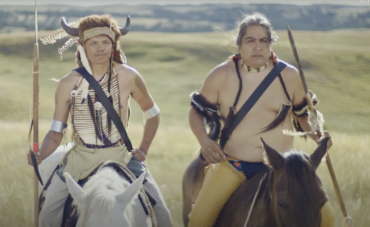 Two Oglala Sioux tribal citizens drive home the importance of wearing seat belts. (Photo/PSA)