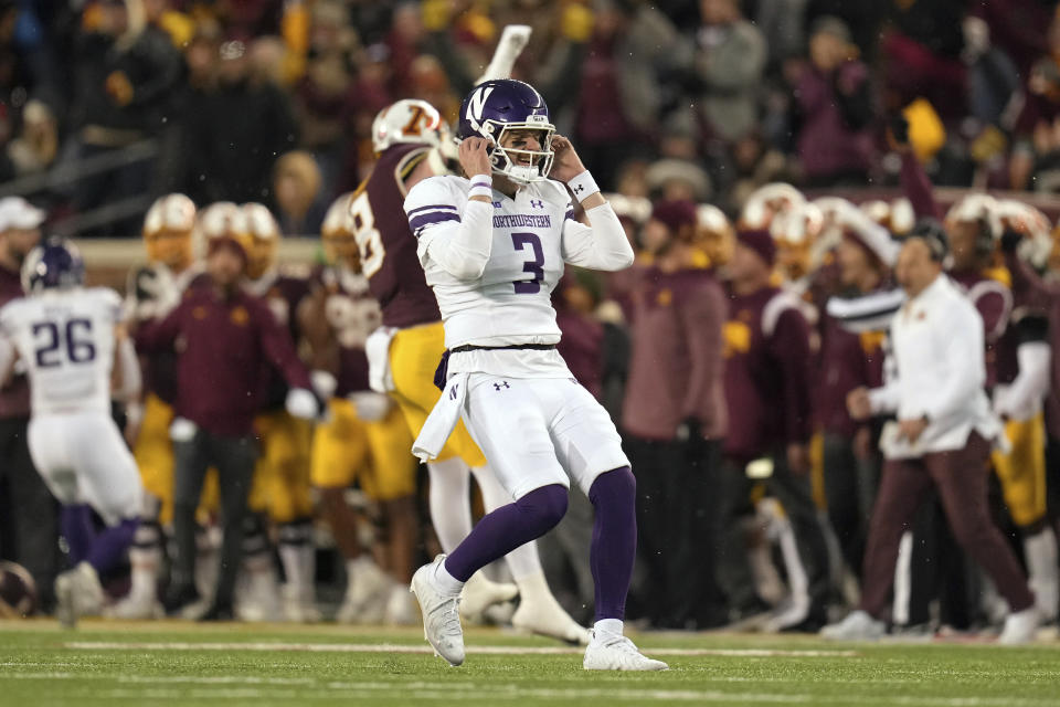 Northwestern quarterback Ryan Hilinski (3) reacts after an unsuccessful fourth down conversion attempt against Minnesota during the second half of an NCAA college football game Saturday, Nov. 12, 2022, in Minneapolis. (AP Photo/Abbie Parr)