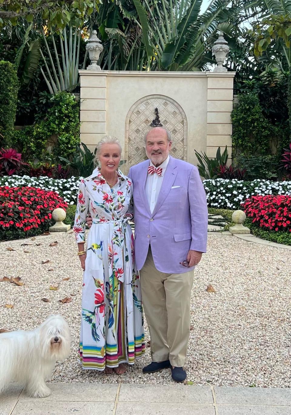 Janie and W. Allan Jones stand at their newly purchased estate at 120 Via Del Lago in Palm Beach, which changed hands for a recorded $29.25 million.