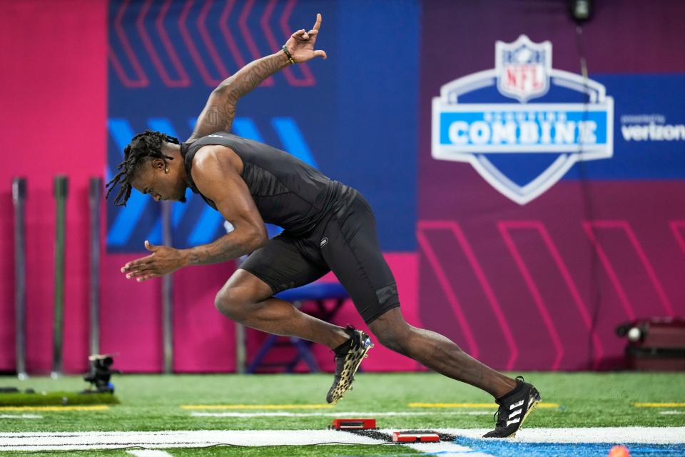 Baylor defensive back Kalon Barnes runs the 40-yard dash at the NFL football scouting combine, Sunday, March 6, 2022, in Indianapolis. (AP Photo/Charlie Neibergall)