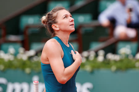 Tennis: Halep rewarded for patience after risky start