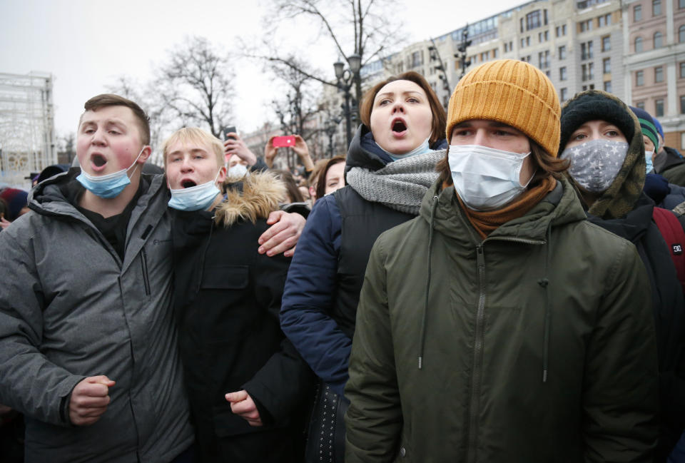 People protest against the jailing of opposition leader Alexei Navalny in Moscow, Russia, Saturday, Jan. 23, 2021. Russian police on Saturday arrested hundreds of protesters who took to the streets in temperatures as low as minus-50 C (minus-58 F) to demand the release of Alexei Navalny, the country's top opposition figure. A Navalny, President Vladimir Putin's most prominent foe, was arrested on Jan. 17 when he returned to Moscow from Germany, where he had spent five months recovering from a severe nerve-agent poisoning that he blames on the Kremlin. (AP Photo/Alexander Zemlianichenko)