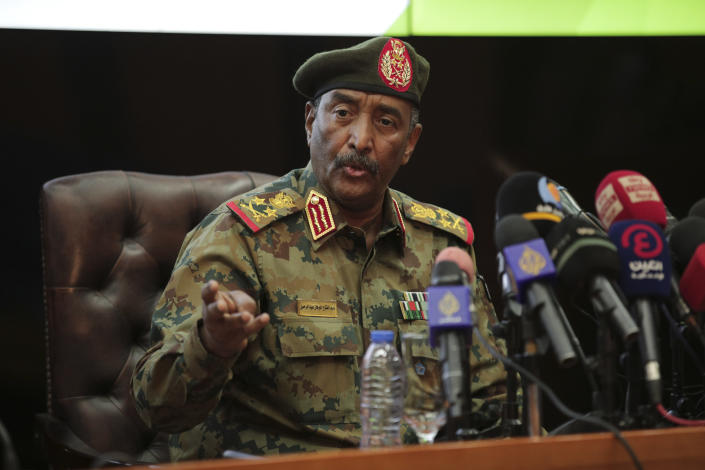 Sudan's head of the military, Gen. Abdel-Fattah Burhan,peaks during a press conference at the General Command of the Armed Forces in Khartoum, Sudan, Tuesday, Oct. 26, 2021. Burhan said that some members of the government he dissolved in a coup could face trial but said that the deposed prime minister was being held for his own safety and would likely be released soon. (AP Photo/Marwan Ali)