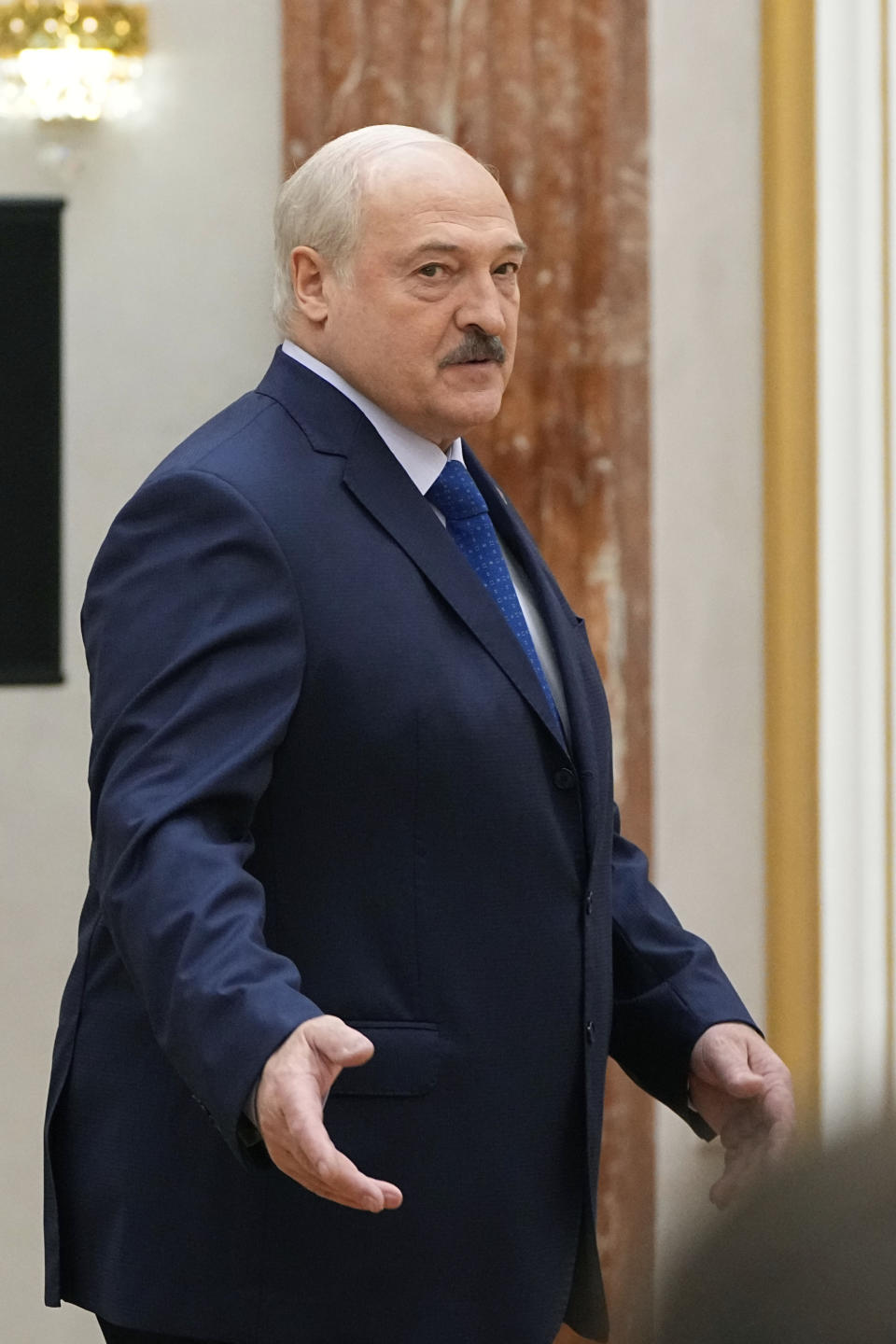 Belarusian President Alexander Lukashenko arrives to attend a meeting with foreign correspondents, in Minsk, Belarus, Thursday, July 6, 2023. (AP Photo/Alexander Zemlianichenko)