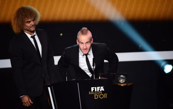 Fenerbahce's Slovakian winger Miroslav Stoch (C) receives the FIFA Puskas award from former Colombian footballer Carlos Valderrama during the FIFA Ballon d'Or awards ceremony at the Kongresshaus in Zurich on January 7, 2013. AFP PHOTO / OLIVIER MORIN (Photo credit should read OLIVIER MORIN/AFP/Getty Images)