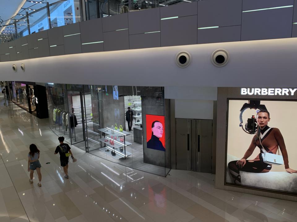 Shoppers in Shanghai’s shopping mall iAMP after a two-month lockdown. - Credit: Denni Hu/WWD