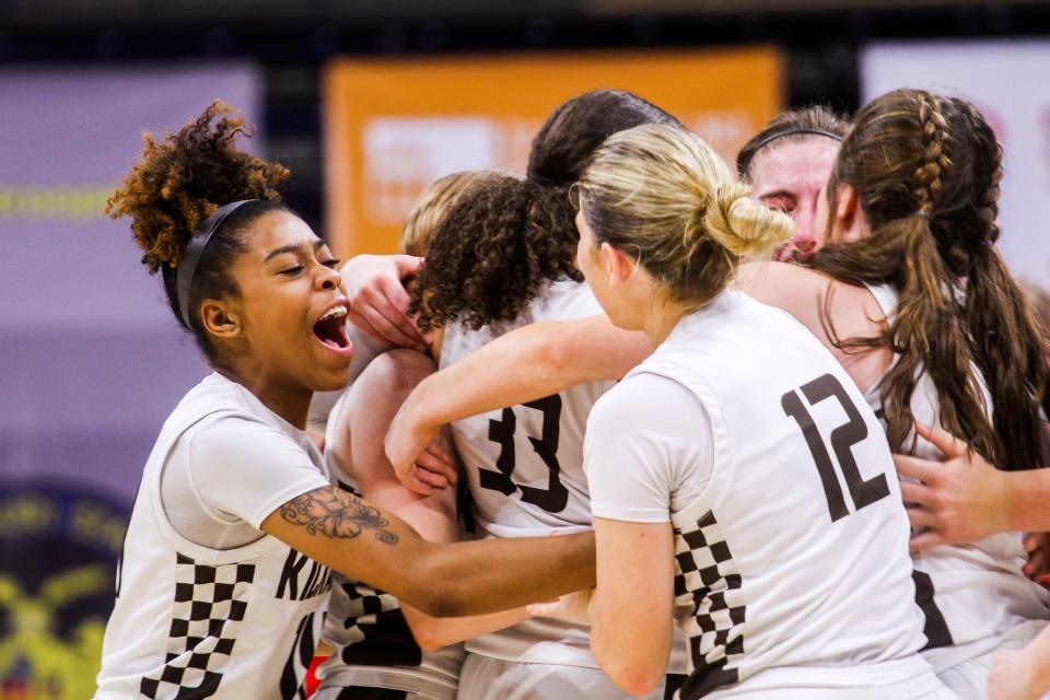 Kickapoo teammates celebrate last-minute three-point shot during the MSHSAA Class 6 semifinal against Cor Jesu Academy at Mizzou Arena on Mar. 15, 2024, in Columbia, Mo.