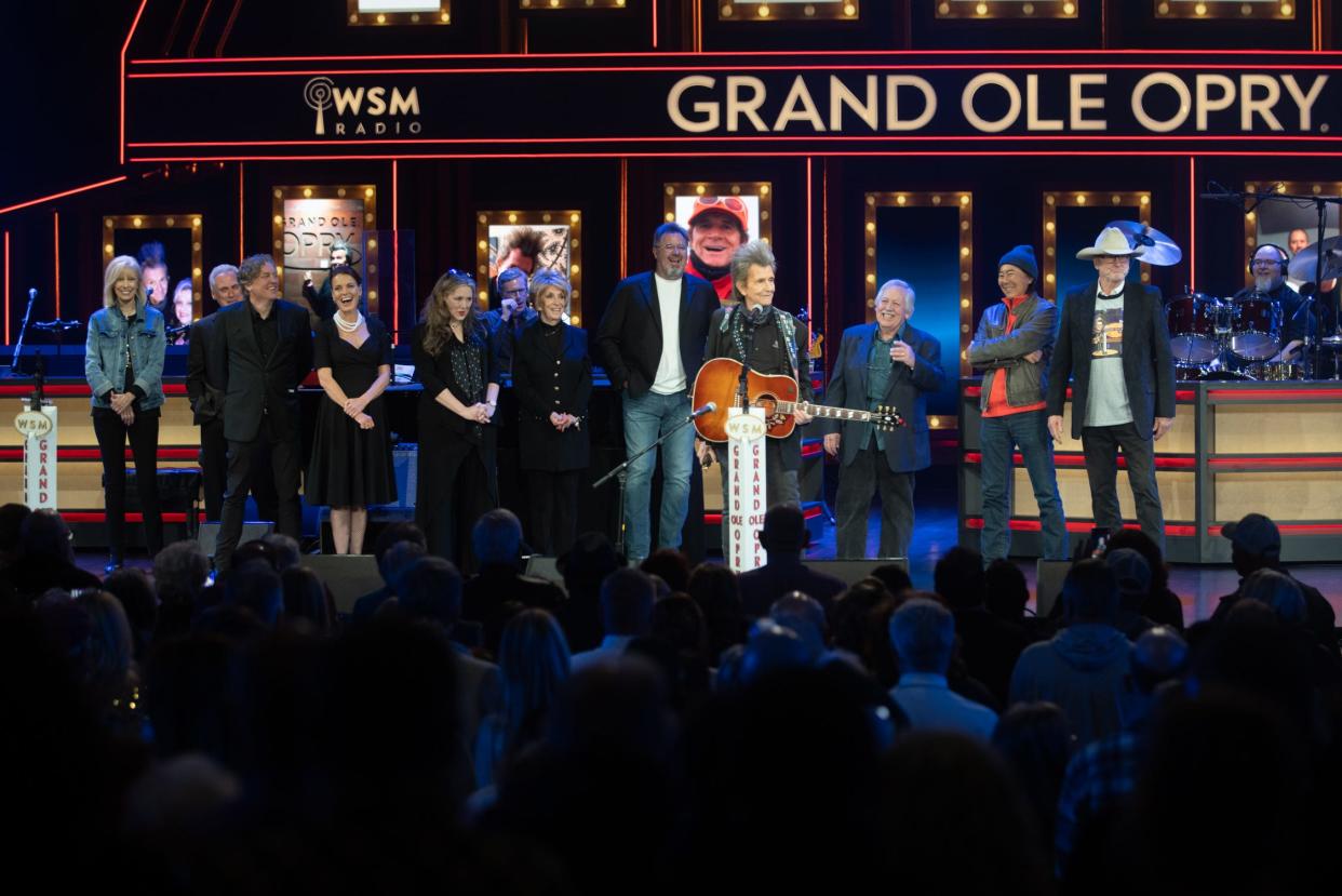 Gary Mule Deer with family and friends onstage Friday as he was welcomed into Grand Ole Opry family.