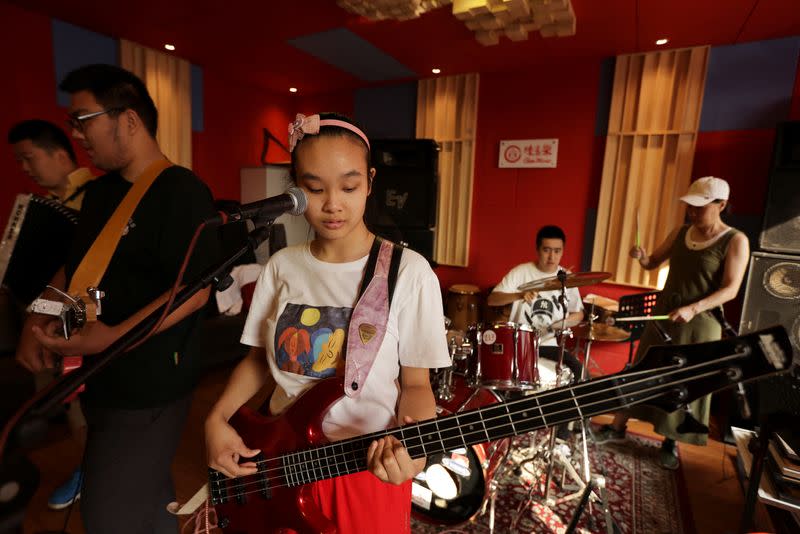 The Wider Image: "Music is their language": school gives autistic Chinese youth a voice