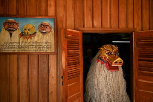 The guardian lion "Singkheo Singkham" leaves to take part in the Laos New Year procession in Luang Prabang