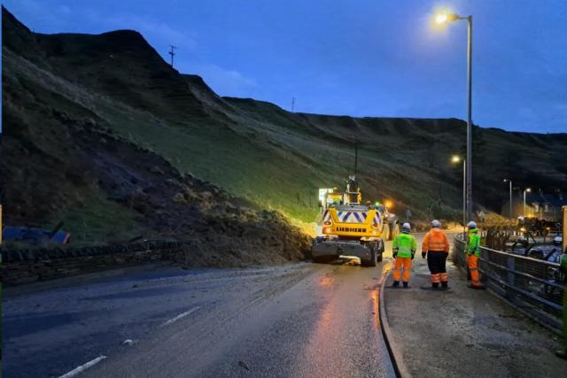 Work commences to clear debris after landslide sparks overnight