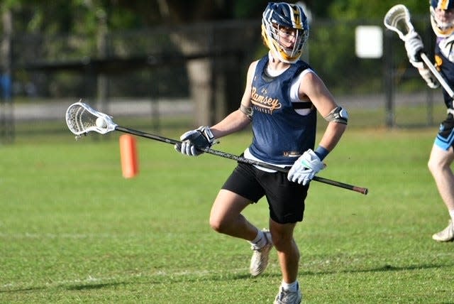 Ramsey's Justus Favata, shown here in a boys lacrosse scrimmage, picked up 38 ground balls as a freshman defender in 2023.