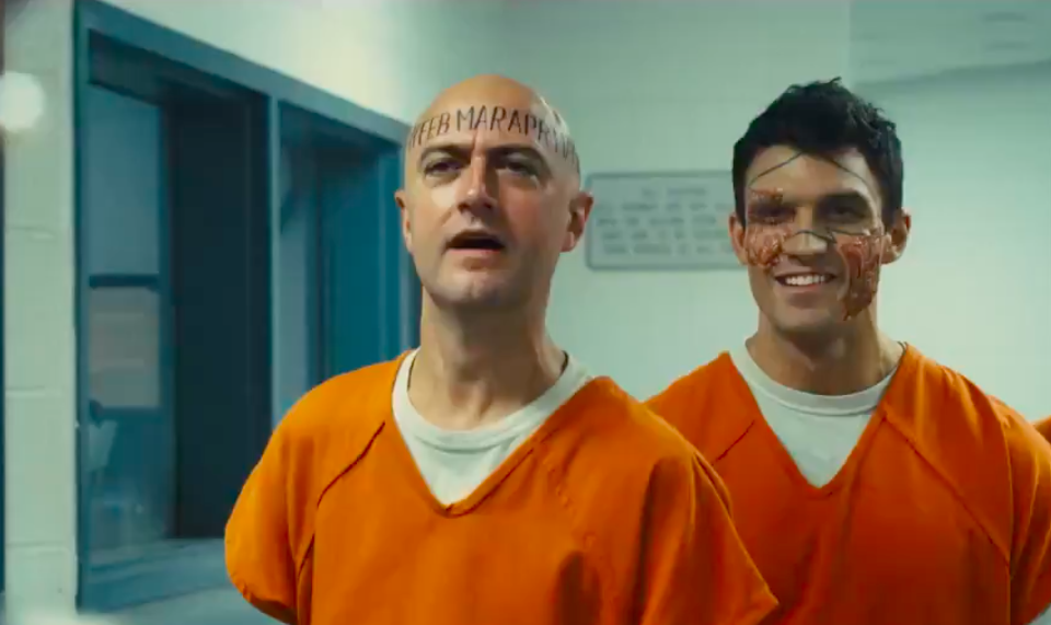 A still from Suicide Squad shows Calendar Man and Double Down in Belle Reve Prison