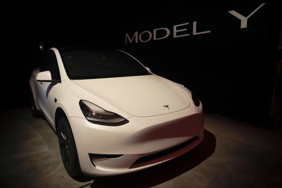 FILE- In this March 14, 2019, file photo Tesla's Model Y is displayed at Tesla's design studio in Hawthorne, Calif. Tesla CEO Elon Musk says the electric car pioneer plans to build a new factory near Berlin. News agency dpa reported that Musk made the announcement during a prizegiving ceremony in the German capital Tuesday evening. (AP Photo/Jae C. Hong, File)