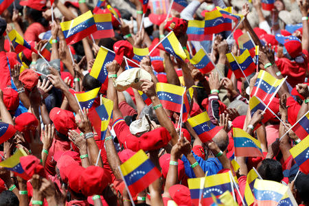 Supporters of Venezuela's President Nicolas Maduro attend a rally in support of the government and to commemorate the 20th anniversary of the arrival to the presidency of the late President Hugo Chavez in Caracas, Venezuela February 2, 2019. REUTERS/Manaure Quintero