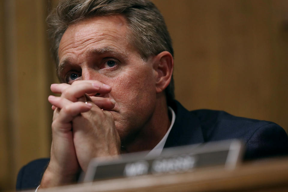 Sen. Jeff Flake listens to Christine Blasey Ford on Thursday. (Photo: Win McNamee/Reuters)