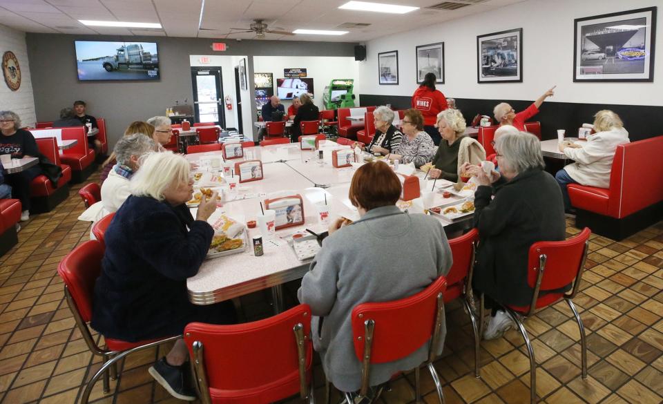 Diners enjoy their lunch last week at Wink's in Barberton.