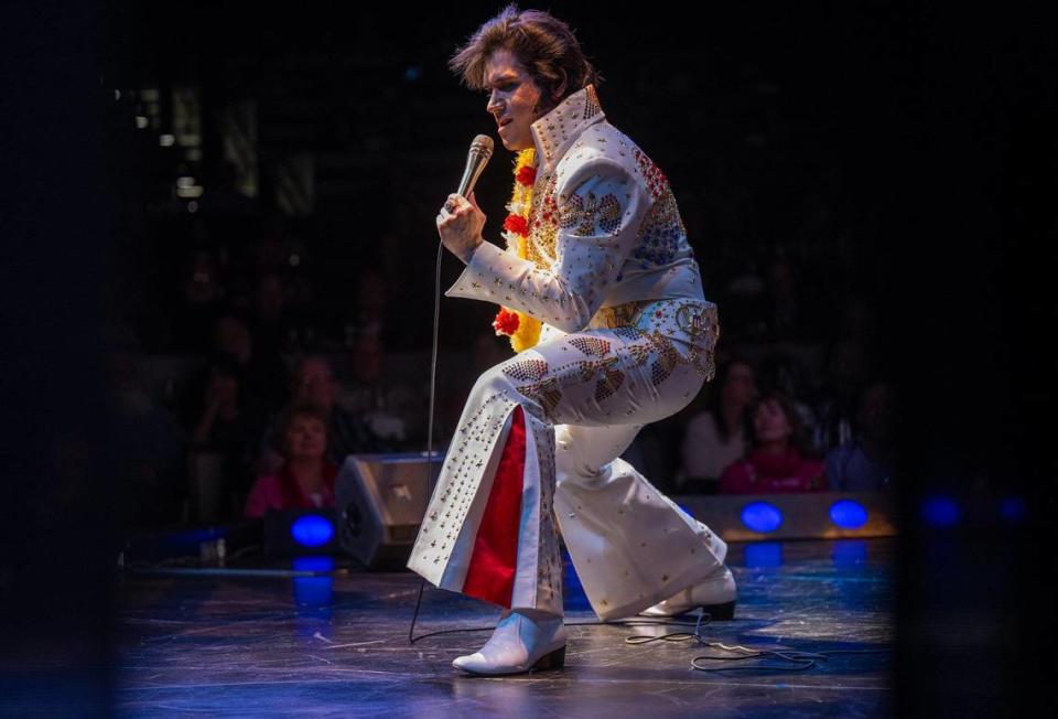 Trevino performs one of the 21 and a half songs while gyrating on stage in the white, rhinestone-studded jumpsuit he wears for the second act of the show.