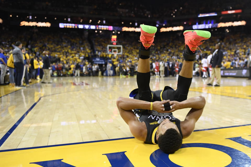 Golden State Warriors guard Stephen Curry #30 reacts after teammate Klay Thompson #11 was injured during second half basketball action in Game 6 of the NBA Finals in Oakland, California, on June 13, 2019. (Photo by The Canadian Press/Frank Gunn)