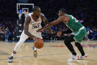 Boston Celtics' Marcus Smart (36) defends New York Knicks' Julius Randle (30) during the first half of an NBA basketball game Wednesday, Oct. 20, 2021, in New York. (AP Photo/Frank Franklin II)