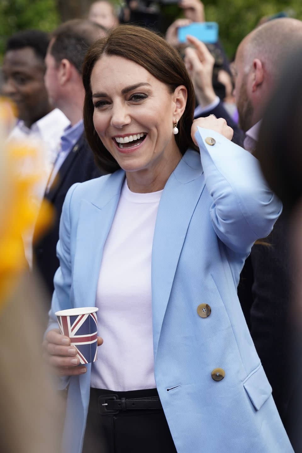 windsor, england may 07 catherine, princess of wales smiles during a walkabout meeting members of the public on the long walk near windsor castle, where the coronation concert to celebrate the coronation of king charles iii and queen camilla is being held this evening on may 7, 2023 in windsor, england the coronation of charles iii and his wife, camilla, as king and queen of the united kingdom of great britain and northern ireland, and the other commonwealth realms took place yesterday at westminster abbey today charles acceded to the throne on 8 september 2022, upon the death of his mother, elizabeth ii photo by andrew matthews wpa poolgetty images