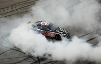 TALLADEGA, AL - OCTOBER 23: Clint Bowyer, driver of the #33 Chevy 100 Years Chevrolet, performs a burnout after winning the NASCAR Sprint Cup Series Good Sam Club 500 at Talladega Superspeedway on October 23, 2011 in Talladega, Alabama. (Photo by Kevin C. Cox/Getty Images for NASCAR)