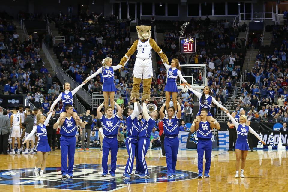 KANSAS CITY, MO - MARCH 29: The Kentucky Wildcats mascot and cheerleaders form a large pyramid during a timeout in the second half of an NCAA Midwest Regional Sweet Sixteen game between the Houston Cougars and Kentucky Wildcats on March 29, 2019 at Sprint Center in Kansas City, MO.  (Photo by Scott Winters/Icon Sportswire via Getty Images)