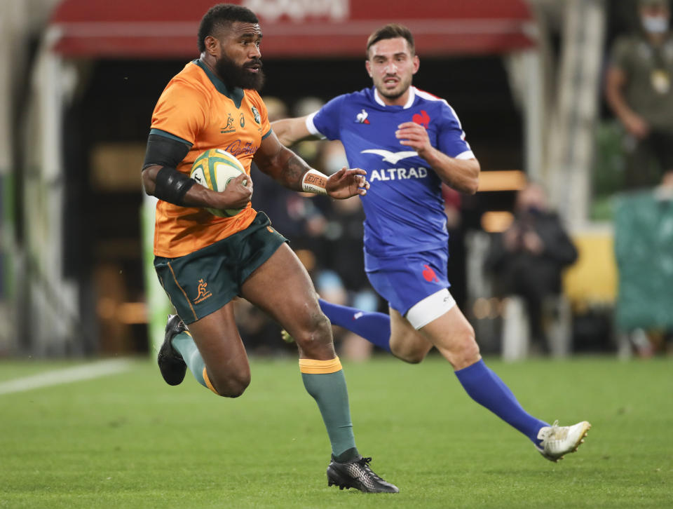 Australia's Marika Koroibete makes a run during the second rugby test between France and Australia in Melbourne, Australia, Tuesday, July 13, 2021. (AP Photo/Asanka Brendon Ratnayake)