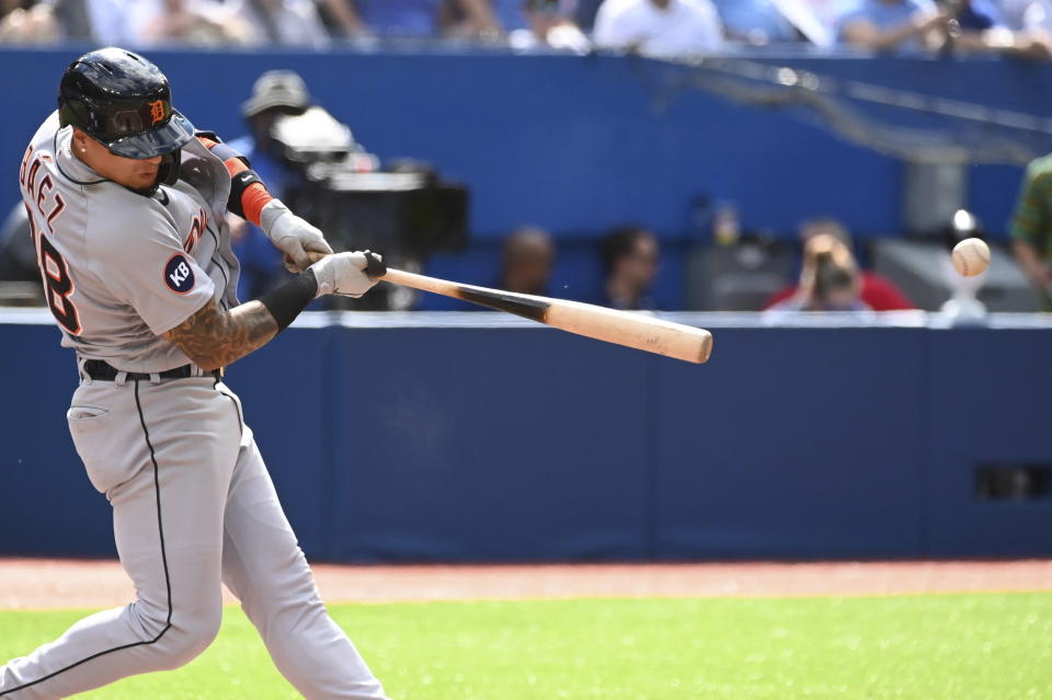 Detroit Tigers' Javier Baez hits a single against the Toronto Blue Jays in the fourth inning of a baseball game in Toronto, Saturday, July 30, 2022. (Jon Blacker/The Canadian Press via AP)