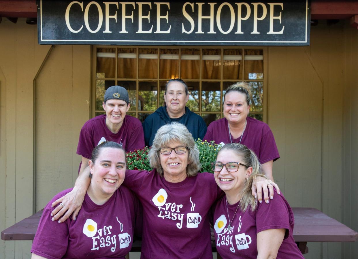Robyn Hale, center, owns Over Easy Café in Sterling.