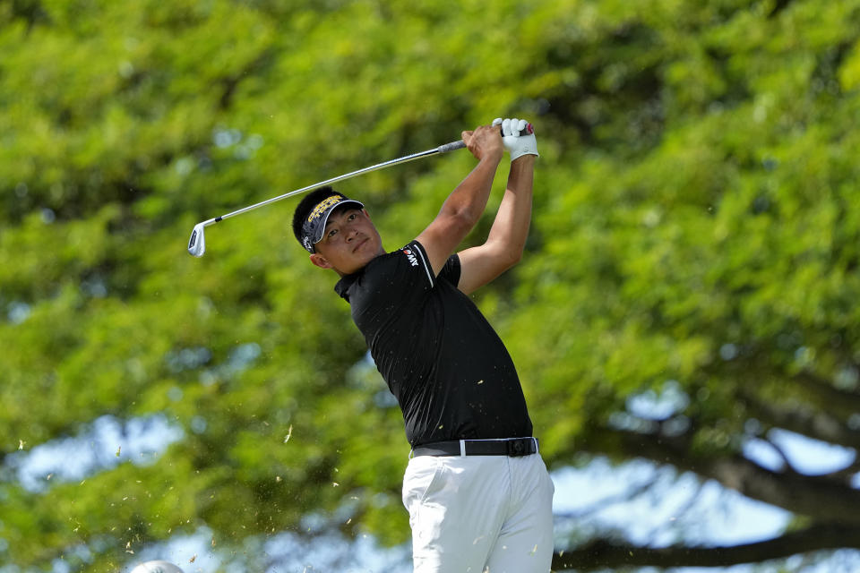 Carl Yuan hits from the second tee during the third round of the Sony Open golf event, Saturday, Jan. 13, 2024, at Waialae Country Club in Honolulu. (AP Photo/Matt York)