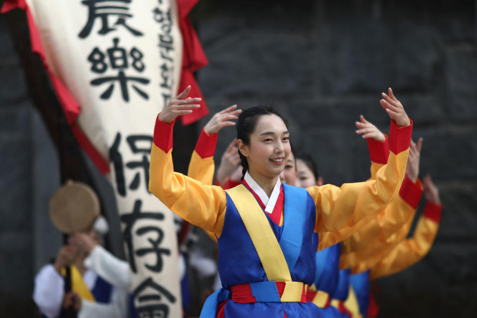 Performers wore traditional clothes and played games, thought to bring good fortune, at the Lunar New Year event inside Gyeongbokgung Palace on Feb. 11, 2024, in Seoul, South Korea.<span class="copyright">Chung Sung-Jun—Getty Images</span>