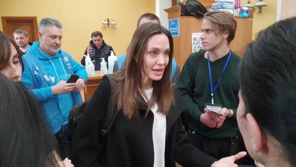 Angelina Jolie speaks while meeting with volunteers during a visit to Lviv’s main railway station in April (VIA REUTERS)