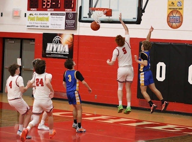 Chad Martin scores for New Boston Huron during a 62-44 victory over Jefferson Tuesday night.