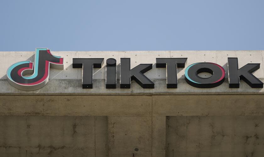 FILE - A TikTok sign is displayed on their building in Culver City, Calif., March 11, 2024. (AP Photo/Damian Dovarganes, File)