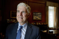 Supreme Court Justice Neil Gorsuch poses for a portrait in his office at the Supreme Court, Monday, July 29, 2024, in Washington. Gorsuch is out with a new book in which he says ordinary Americans are "getting whacked" by too many laws and regulations. "Over Ruled: The Human Toll of Too Much Law" is being published on Tuesday, Aug. 6. (AP Photo/Rod Lamkey, Jr.)