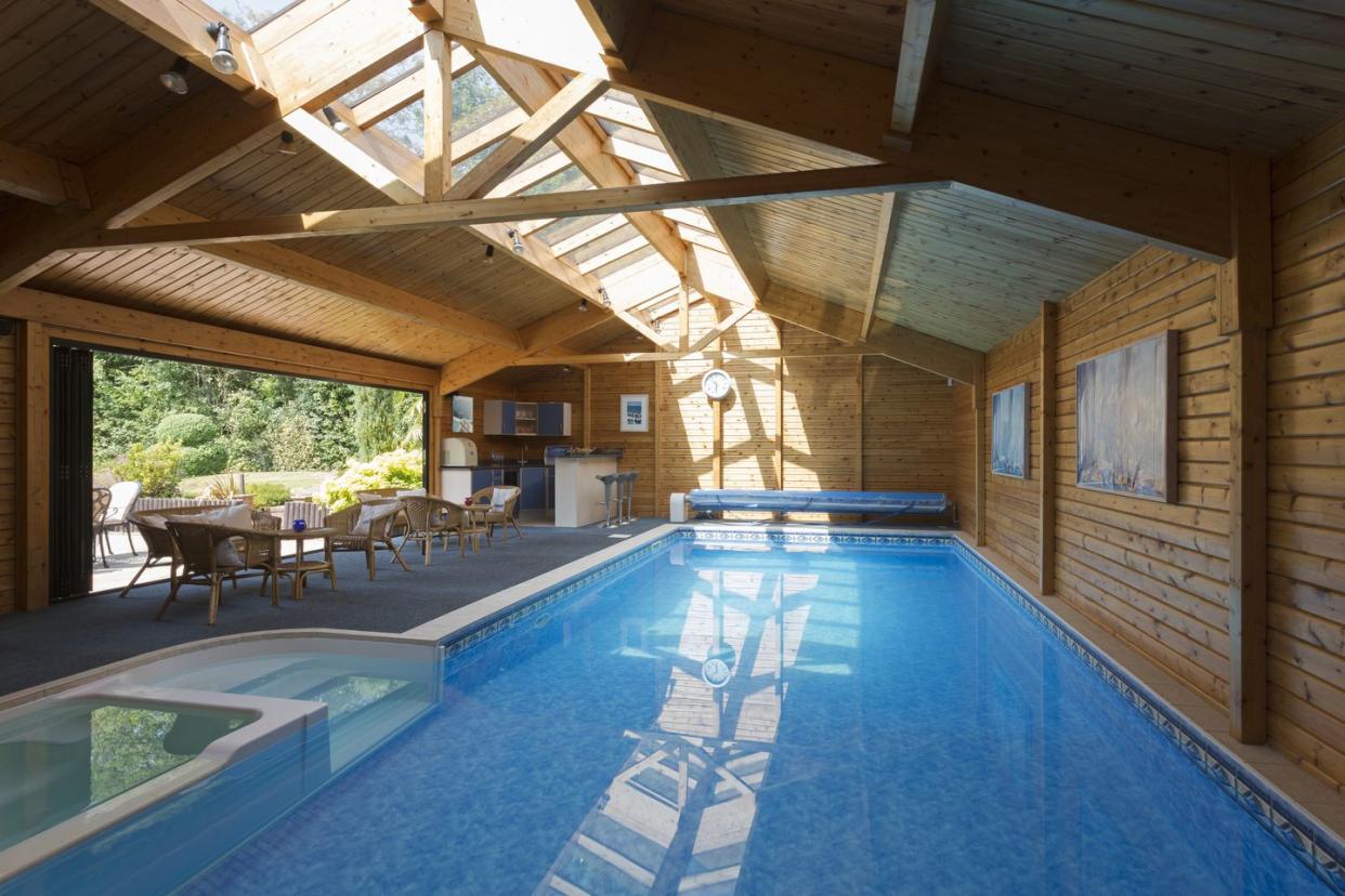 swimming pool designs wooden enclosure