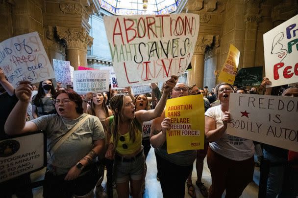 PHOTO: Abortion rights protesters shout into the Senate chamber in the Indiana State Capitol building, July 25, 2022, in Indianapolis. (Jon Cherry/Getty Images)