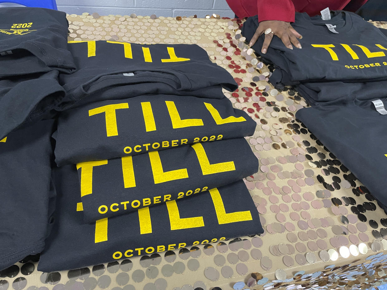 T-shirts promoting the movie "Till" were given away during a free screening of the movie in Mound Bayou, Miss., on Thursday, Oct. 27, 2022. The feature film is going into wide release across the U.S. this weekend after being in limited release since Oct. 14. (AP Photo/Emily Wagster Pettus)