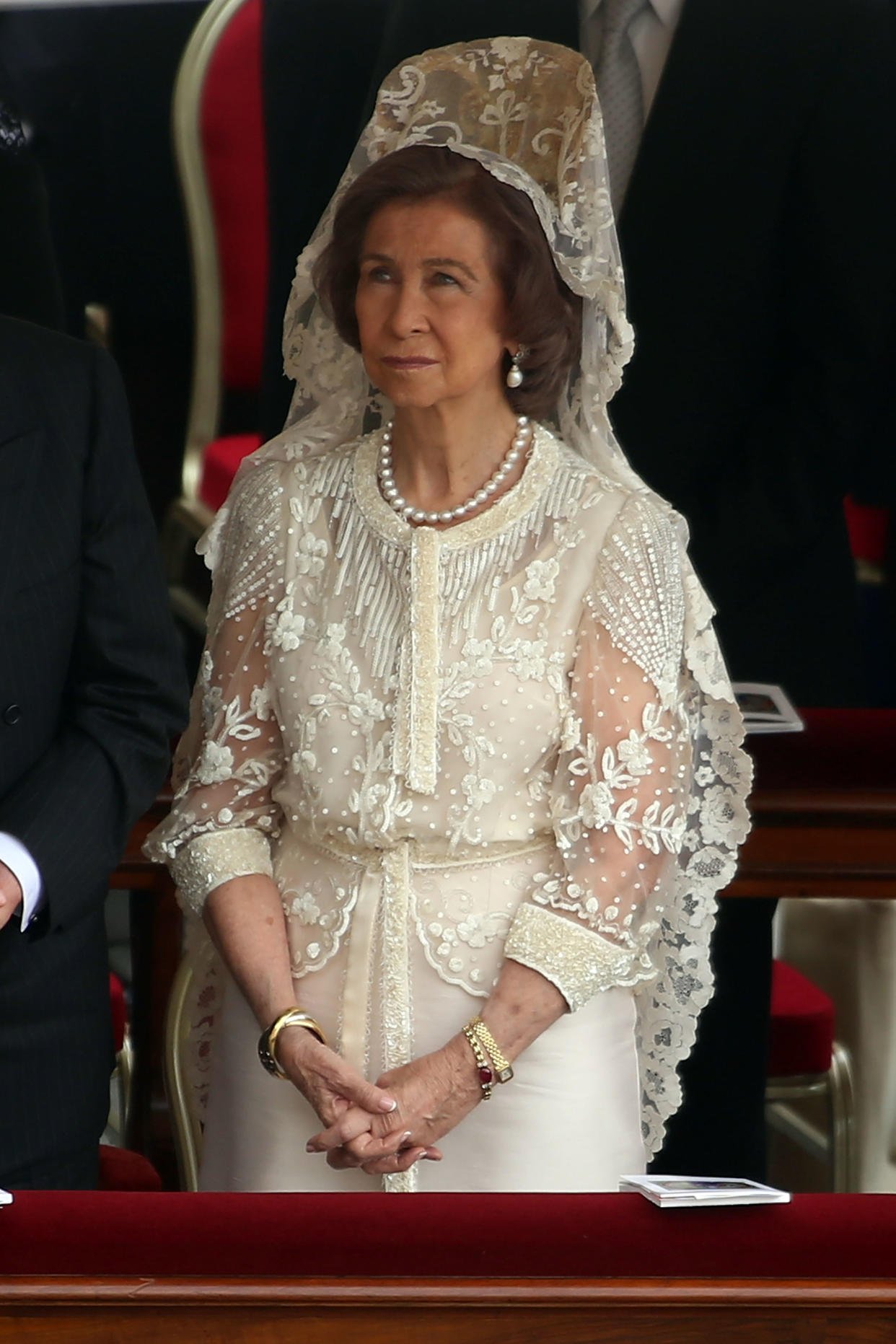 Queen Sofia of Spain wears white in Vatican City. (Photo by Franco Origlia/Getty Images)