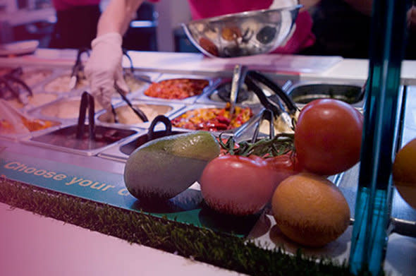 A self-service salad counter at Tossed.