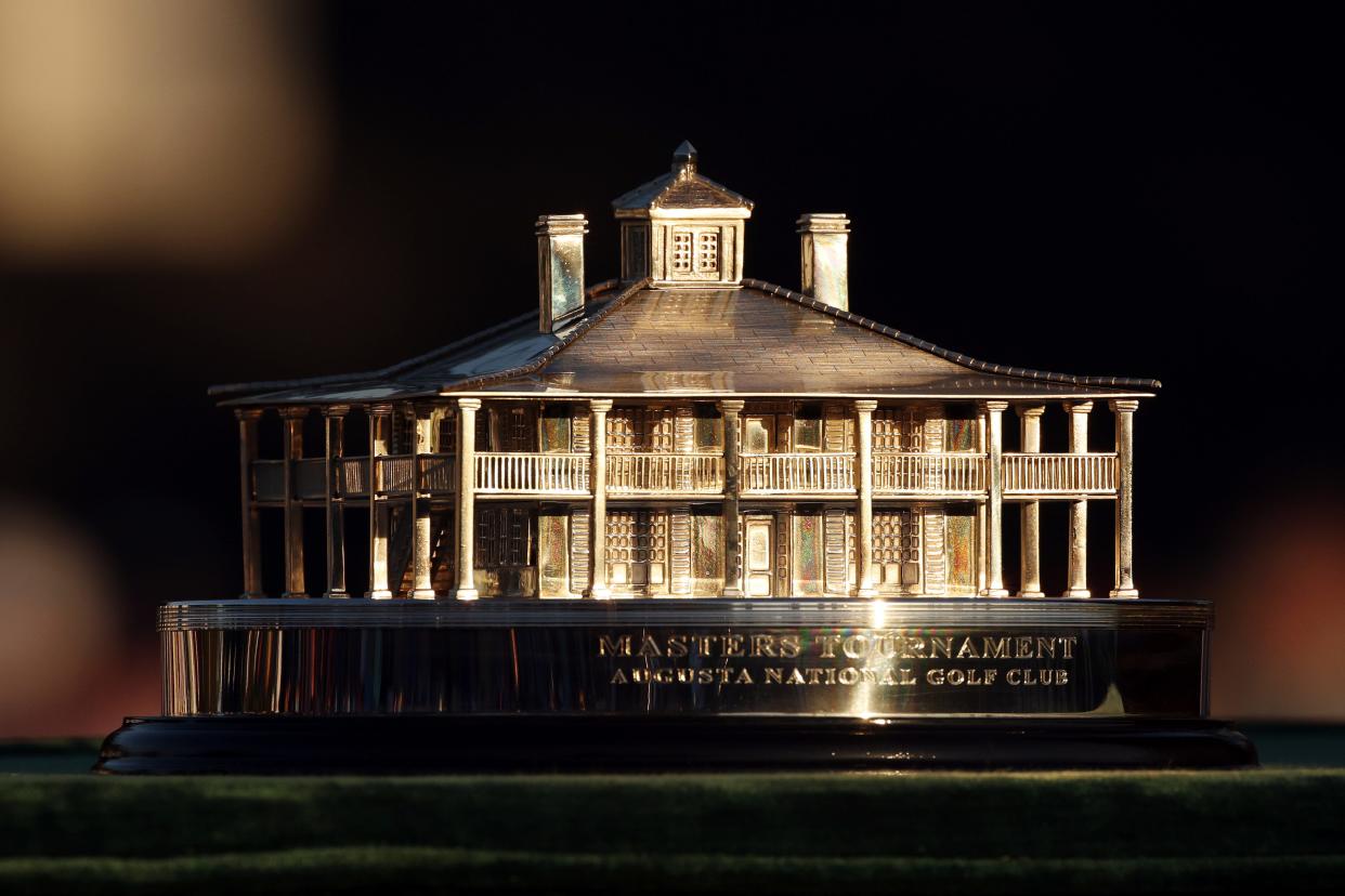 A Masters Tournament trophy featuring a gold building.