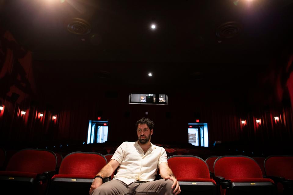 Ali Alsaleh, actor, sits inside the theater at Belcourt Theatre in Nashville , Tenn., Thursday, June 30, 2022. Alsaleh and his family were political refugees who fled Iraq in 2000 and moved to Nashville.