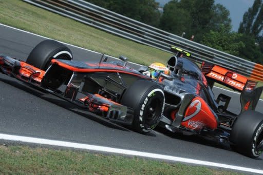 McLaren Mercedes' British driver Lewis Hamilton drives at the Hungaroring circuit on July 27, 2012 in Budapest. Hamilton led team-mate Jenson Button as McLaren topped the times during Friday morning's first free practice for Sunday's Hungarian Grand Prix