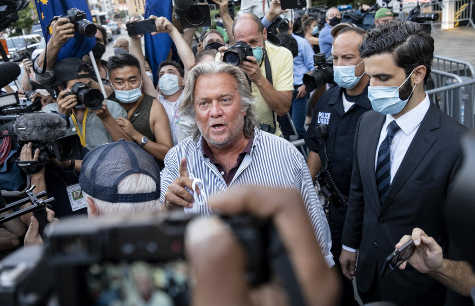 President Donald Trump's former chief strategist Steve Bannon leaves federal court, Thursday, Aug. 20, 2020, after pleading not guilty to charges that he ripped off donors to an online fundraising scheme to build a southern border wall. (AP Photo/Craig Ruttle)