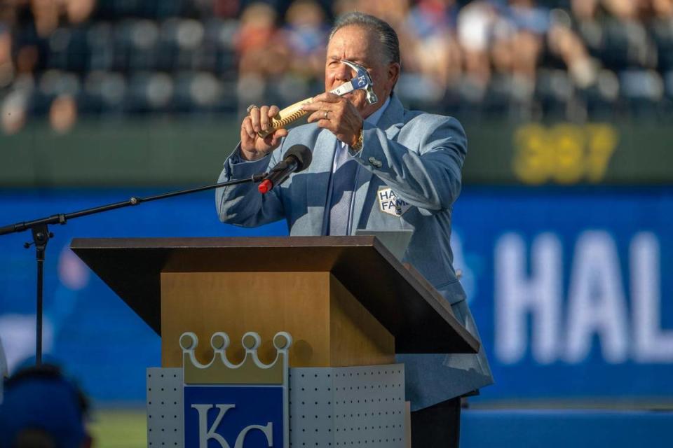 Former Kansas City Royals manager Ned Yost holds a hammer given to him by former general manager Dayton Moore during a Hall of Fame induction ceremony at Kauffman Stadium on Saturday, Sept. 2, 2023, in Kansas City. Emily Curiel/ecuriel@kcstar.com