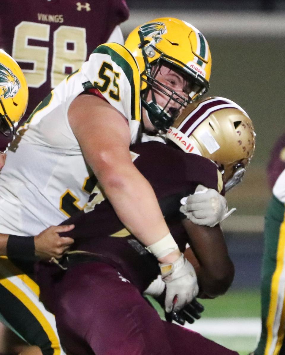 Two-way standout T.J. Burke of Indian River (left) was named the Class 1A Lineman of the Year.